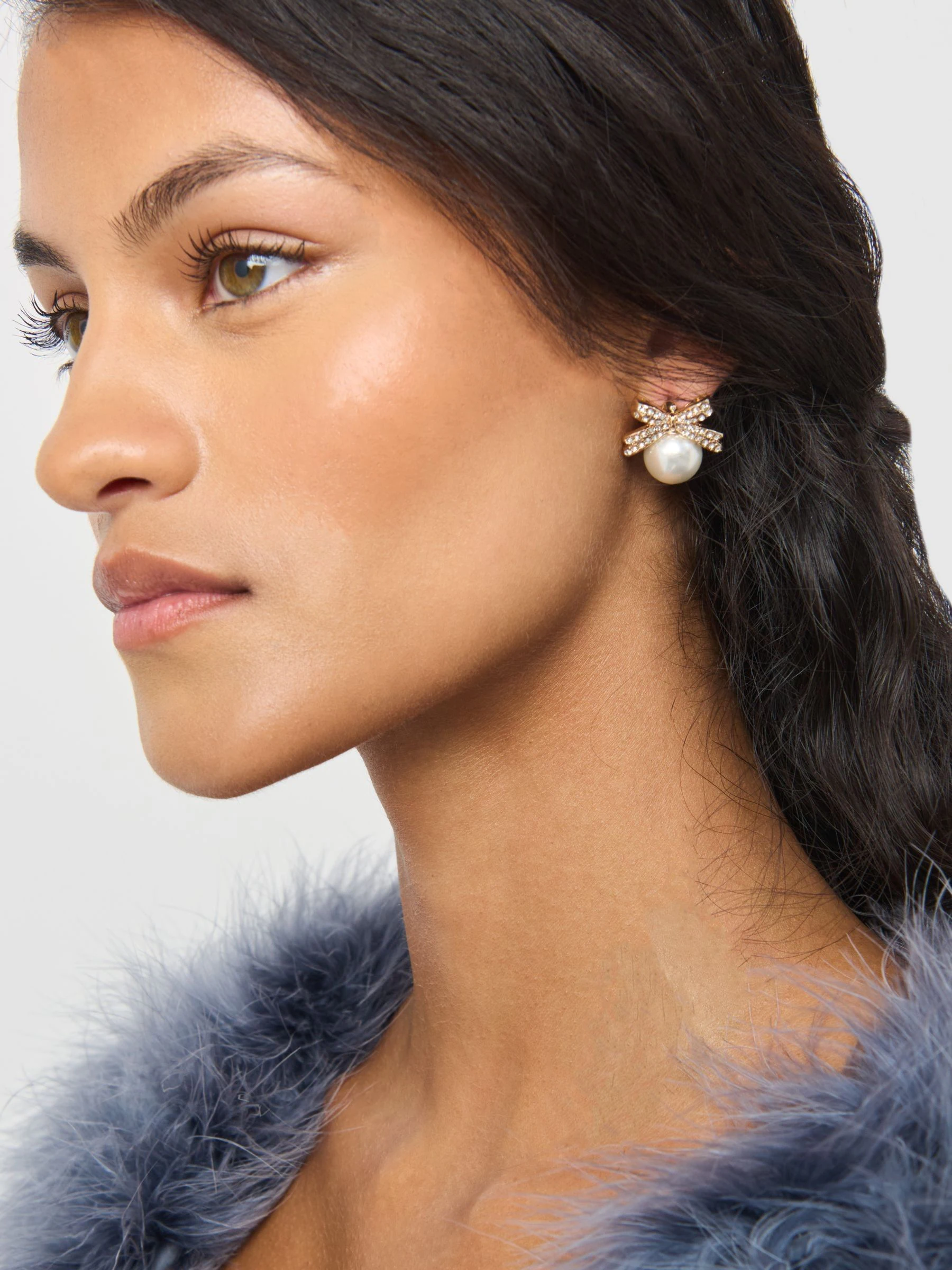 Aela Gold Tone Pearl Bow Stud Earrings