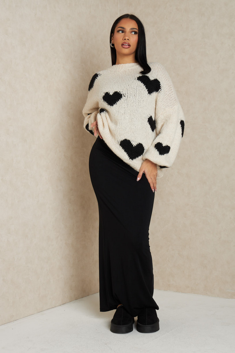 Pull beige à coeur noir