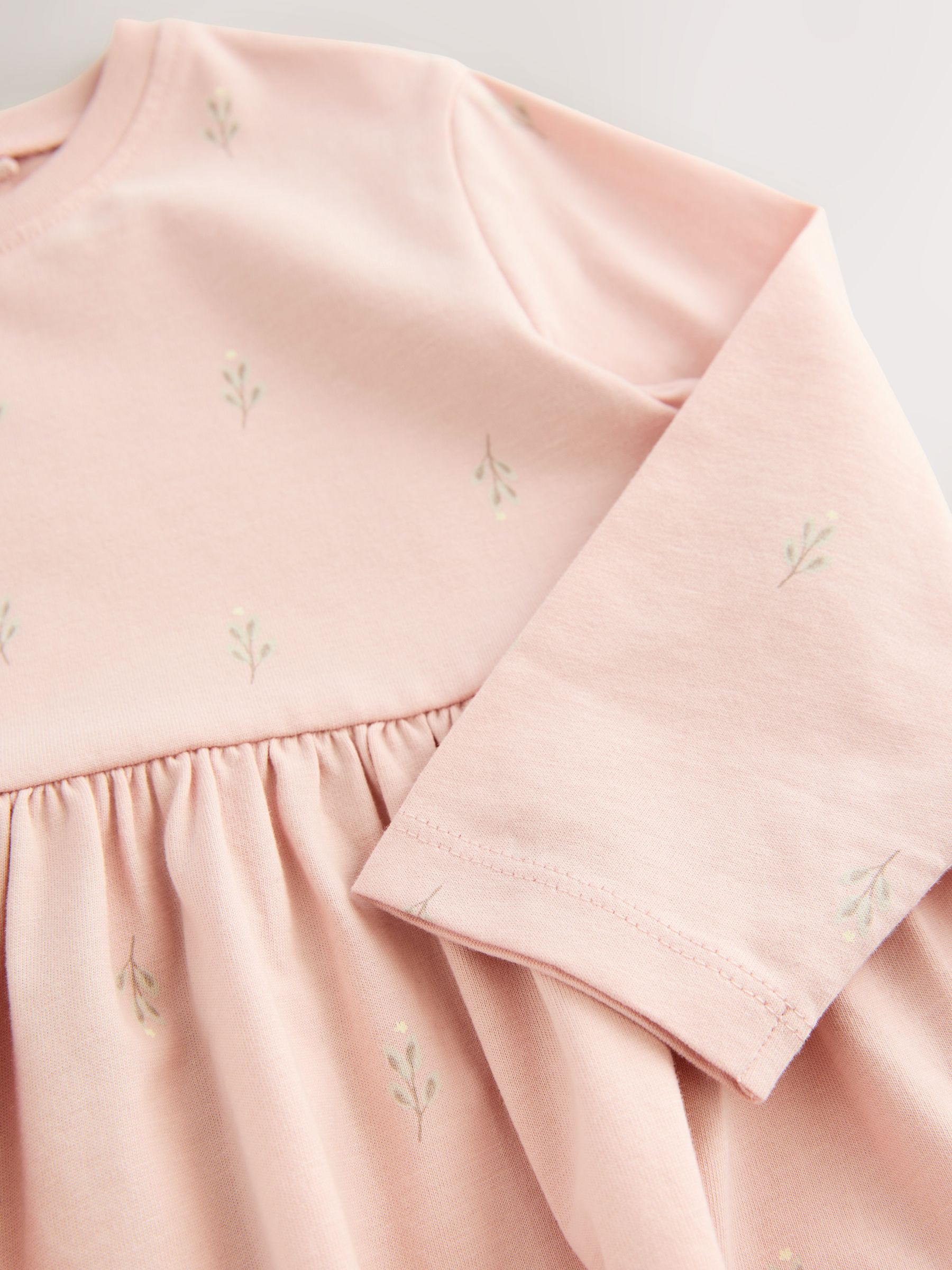Roze met elfjes - Jurk met lange mouwen en versiering (3mnd -7jr)