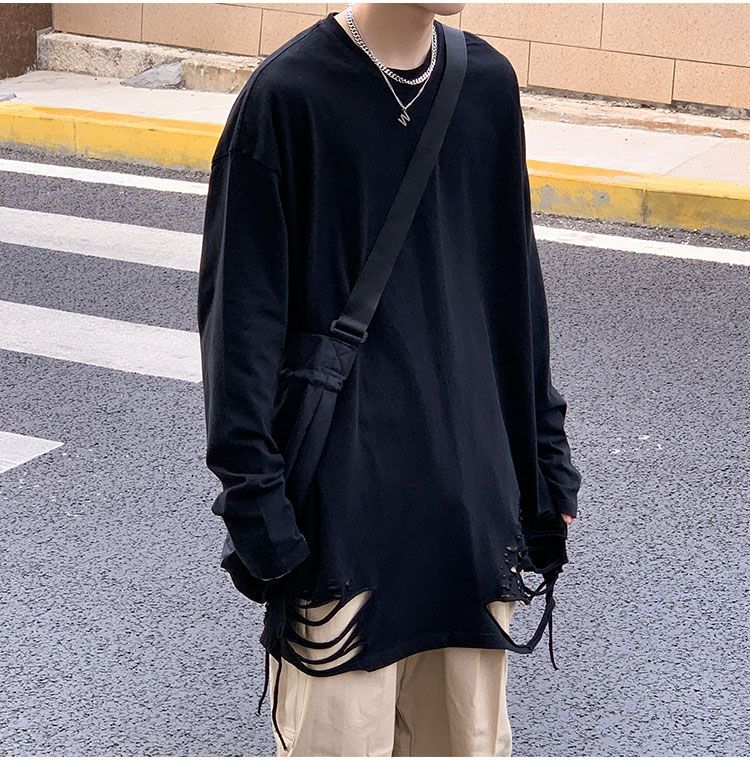 Whyessa - Versleten oversized top met lange mouwen