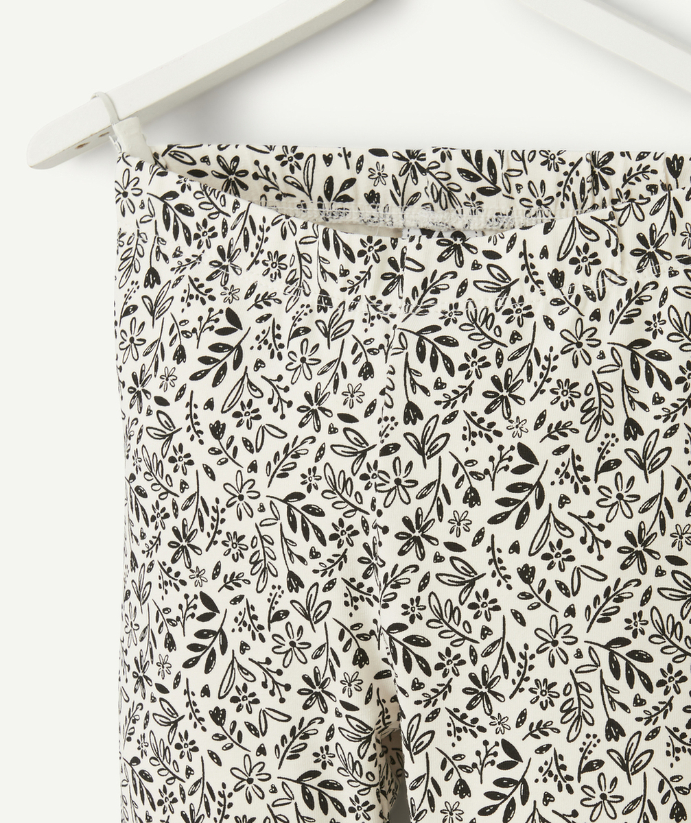 legging fille en coton bio blanc avec imprimé fleurs et feuilles noir