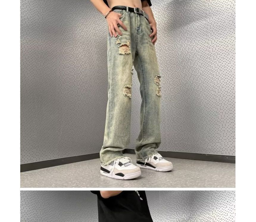 Femilina - High-waist distressed washed jeans met wijde pijpen
