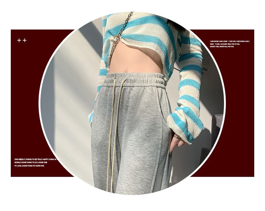 Yohana - Wijde joggingbroek met hoge taille, trekkoord en split