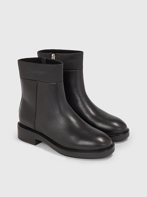 botas de couro até o tornozelo