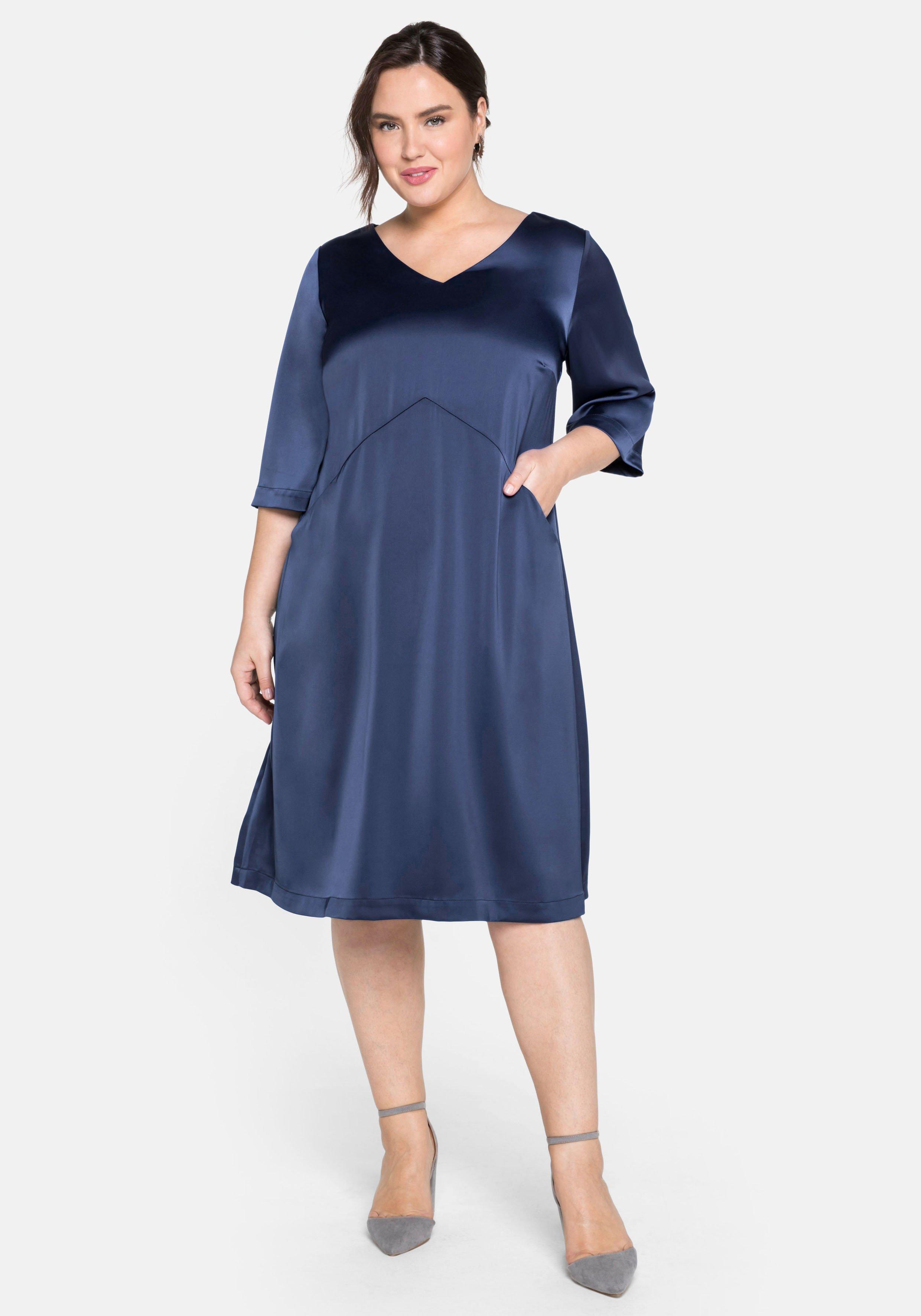 Cocktailkleid mit 3/4-Arm, in weiter A-Linie