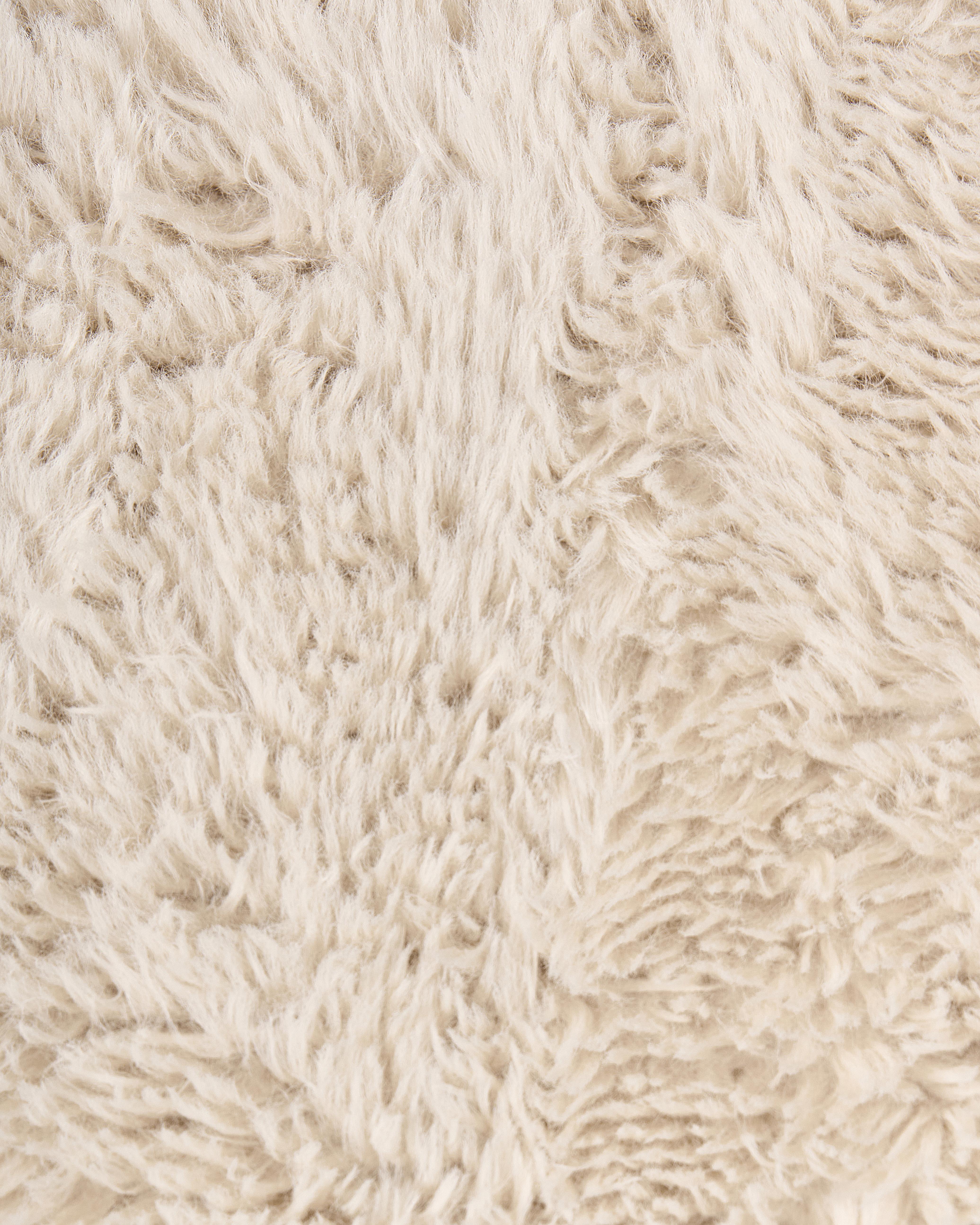 Schommelstoel AKRA Nepbont Lichtbeige