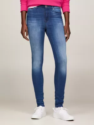Calça jeans Nora de cintura média, skinny e desbotada.