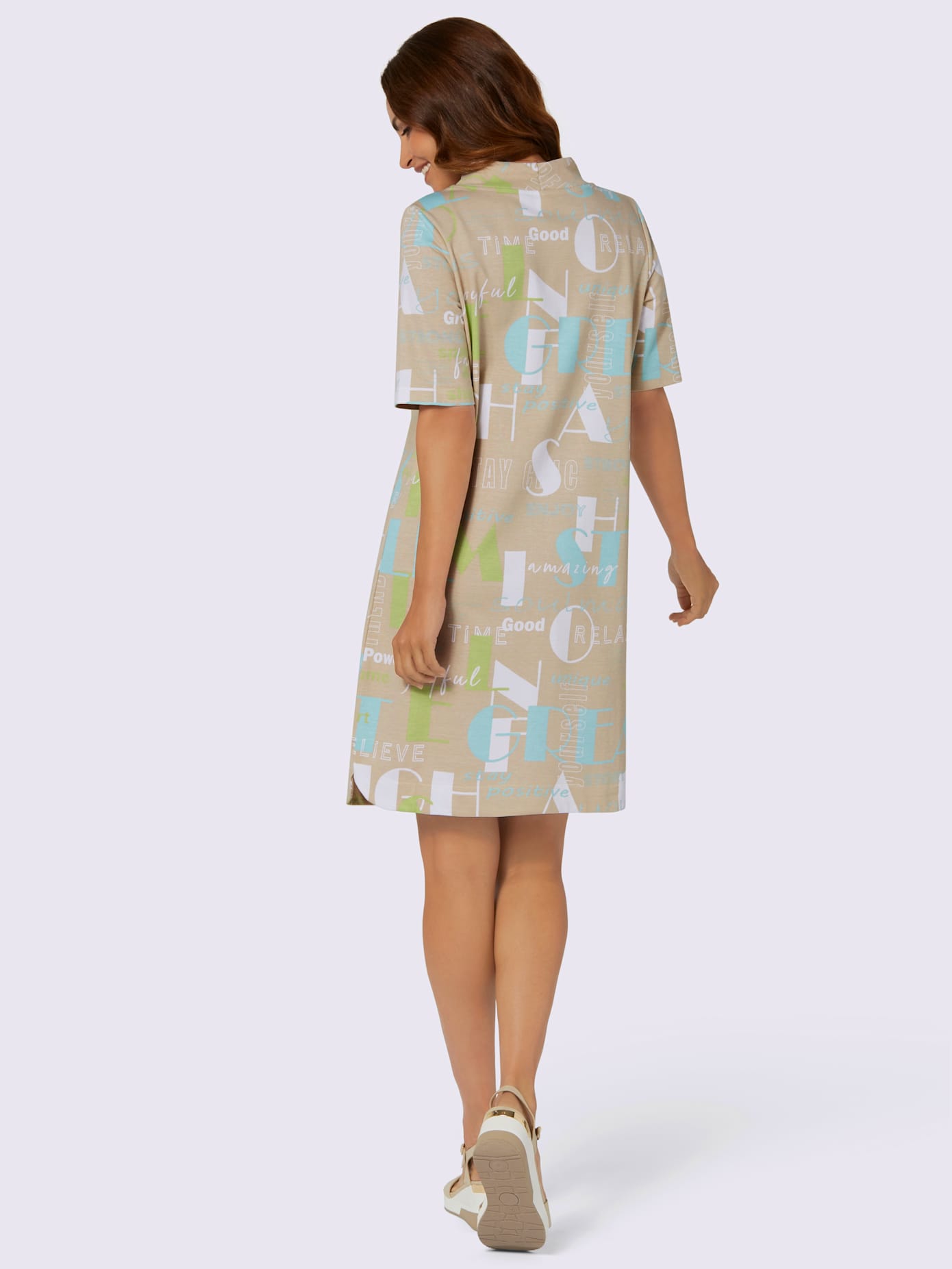 Robe en matière sweat coupe affinante