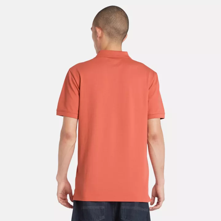 Polo stretch Merrymeeting River pour homme en orange clair