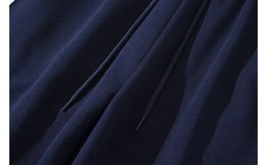 Florentine - Gestreepte cargo-joggingbroek met trekkoord en wijde pijpen