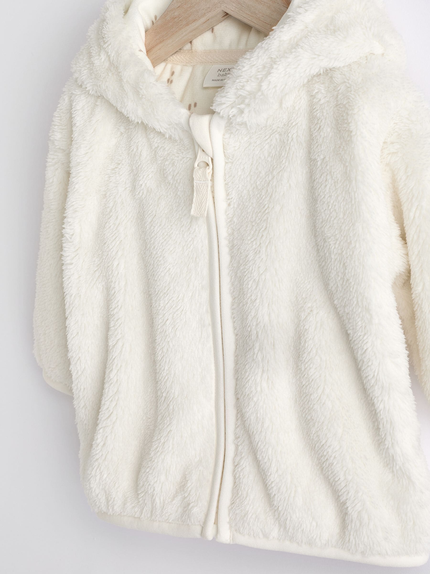Ecru - Fleece babyjack met capuchon (0mnd-2jr)