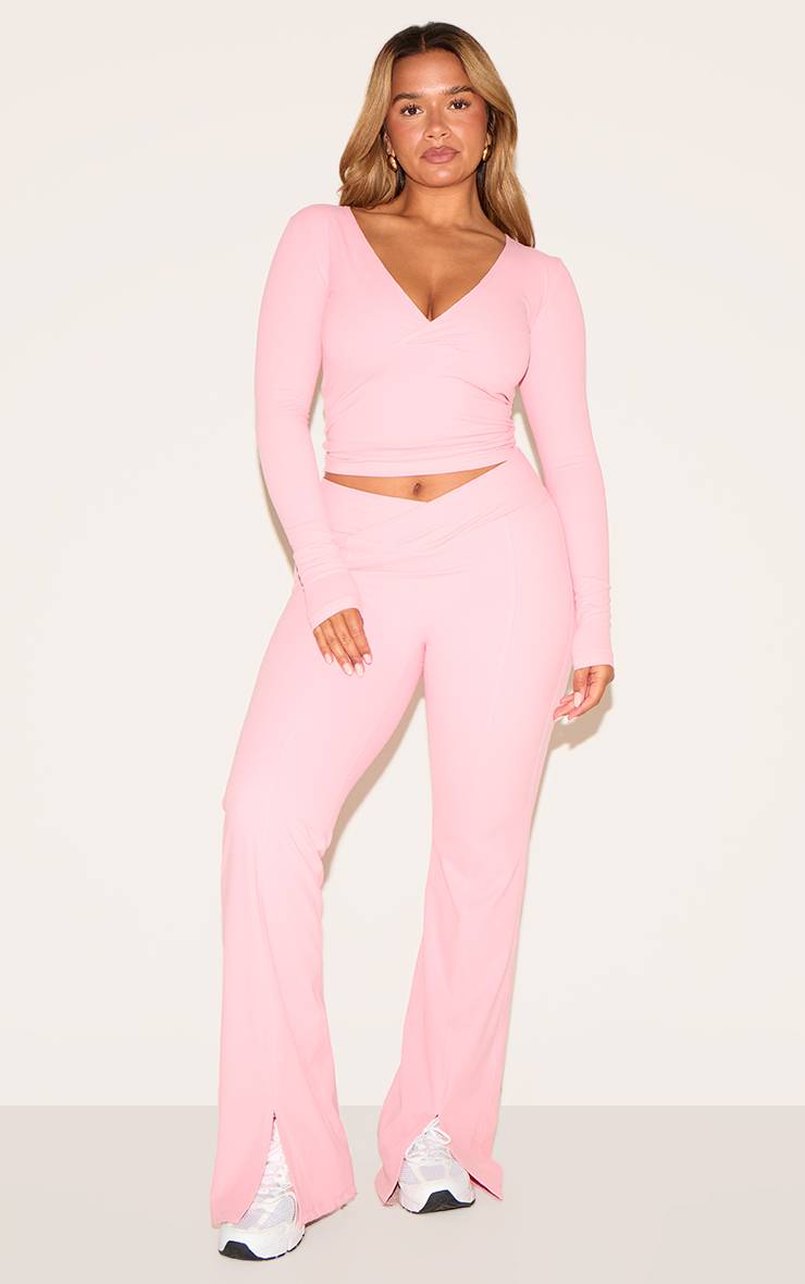 Rose Bonbon Top Moulant Actif À Manches Longues Avec Encolure Cache-cœur Shape Sculpt