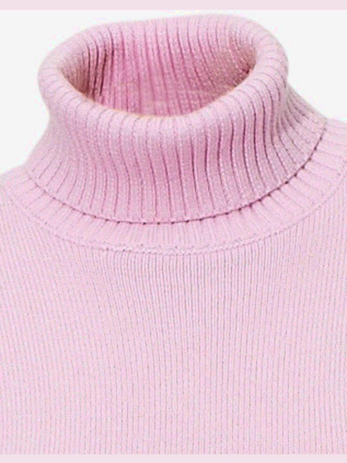 Pull col roulé contenant du cachemire