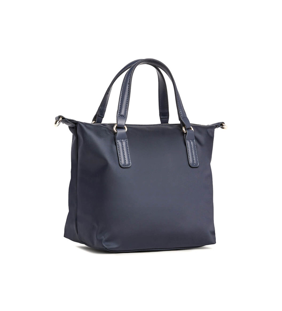 Bolsa pequena Tommy Hilfiger com emblema TH, cor azul marinho.