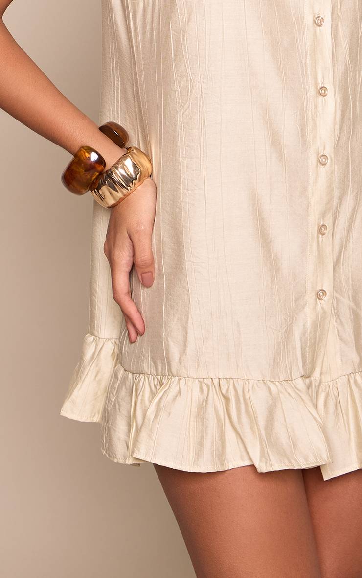 Crème Robe Mini Tissée Texturée À Taille Basse Et Ourlet À Volants