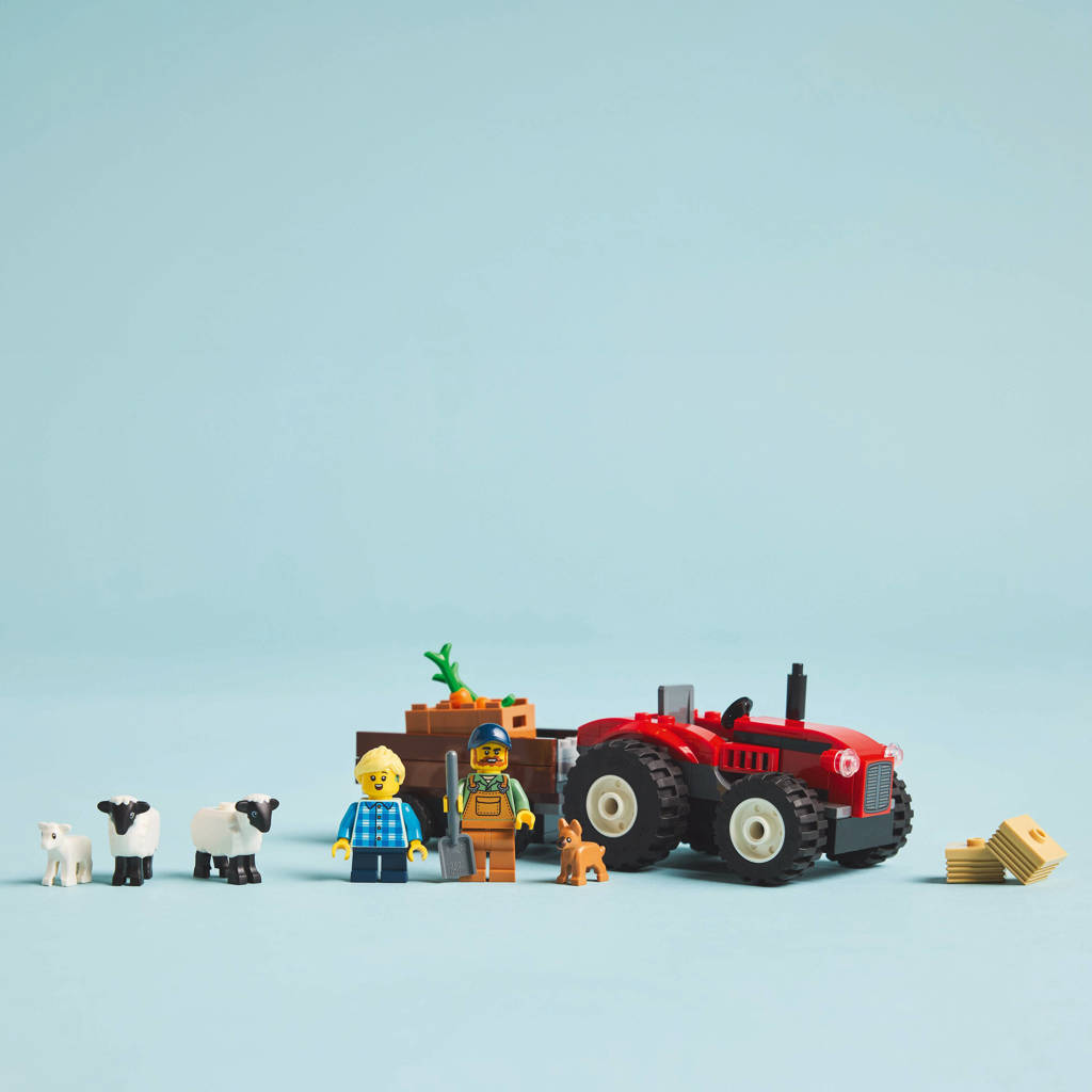 Rode tractor met aanhanger en schapen 60461