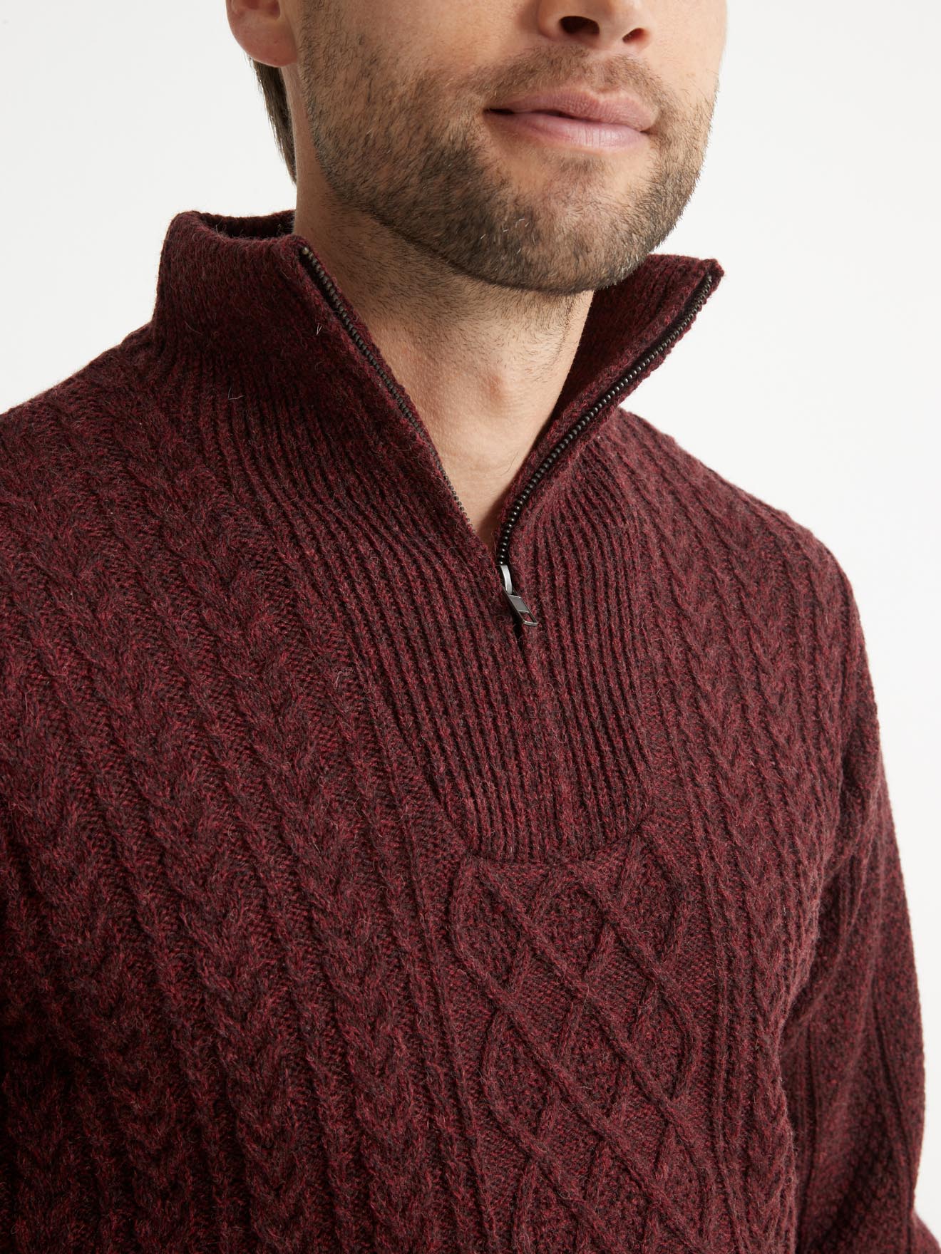 Pull torsadé col montant zippé