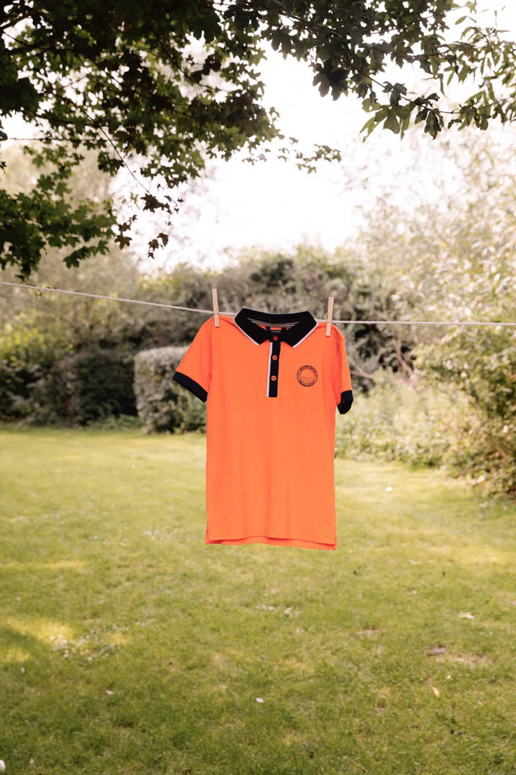 Quapi polo BIKO oranje/donkerblauw