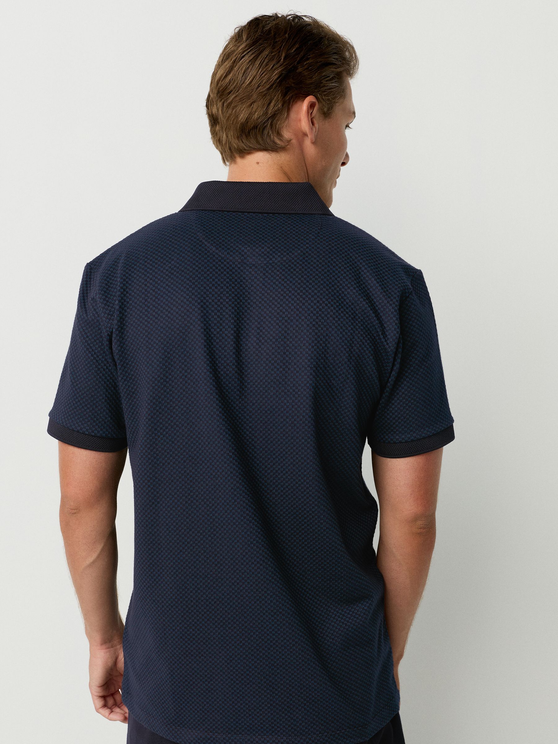 Blauwgroen - Modieus poloshirt met kwartrits