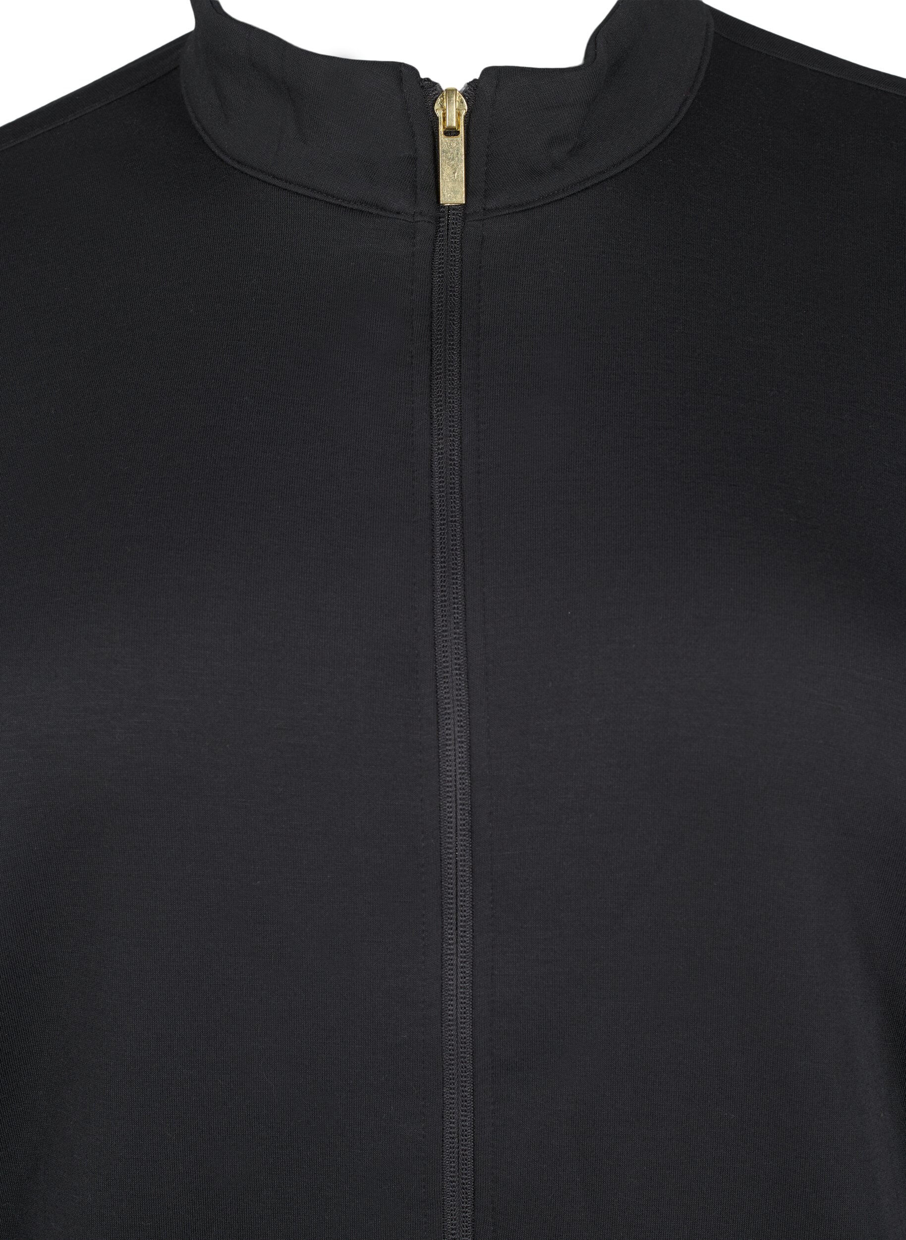 Sporty cardigan med lynlås og lommer
