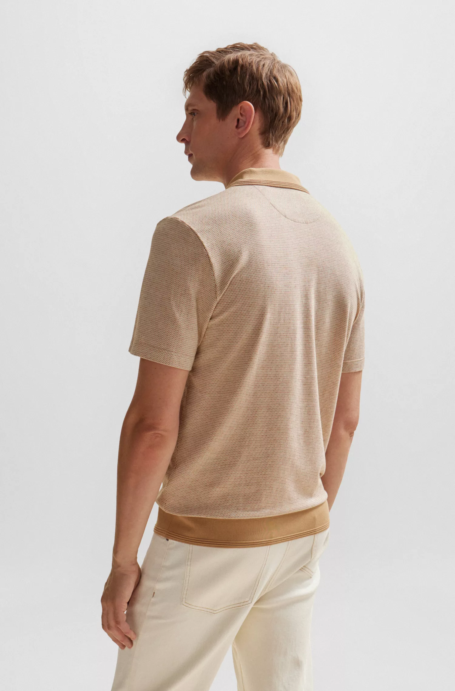 Camisa polo BOSS Camel com estrutura Bubble em algodão e cashmere.
