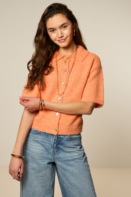 Oranje polo vest met korte mouwen