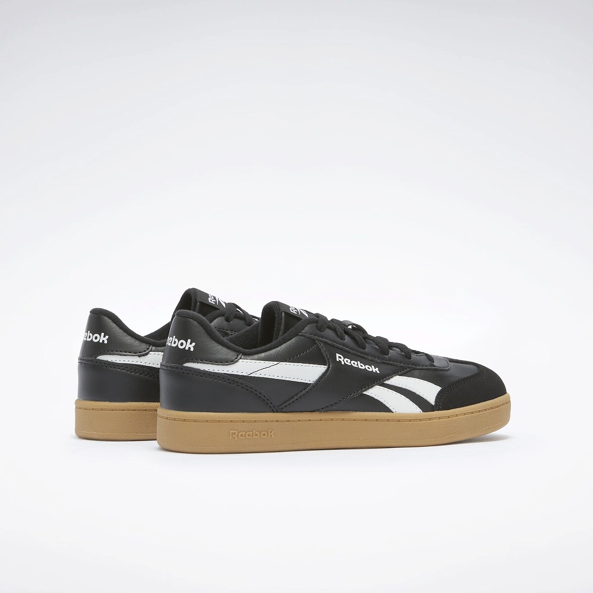 REEBOK<br>Tênis Smash Edge