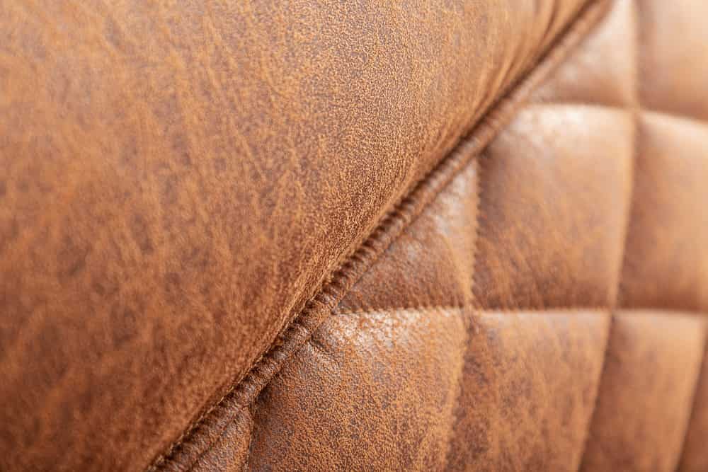 Retro Lounge Sessel MUSTANG LOUNGER antik hellbraun mit Ziersteppung