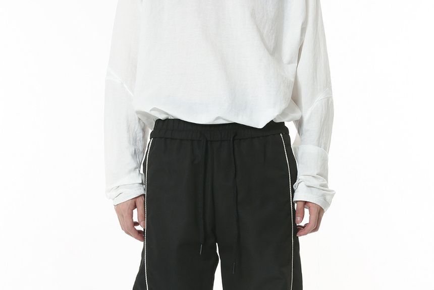 FAERIS - Gestreept jack met rits / Wijde broek met middelhoge taille