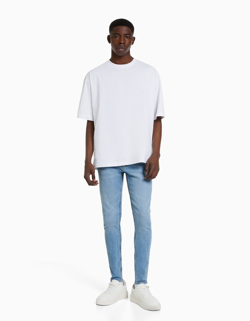 calças jeans super skinny