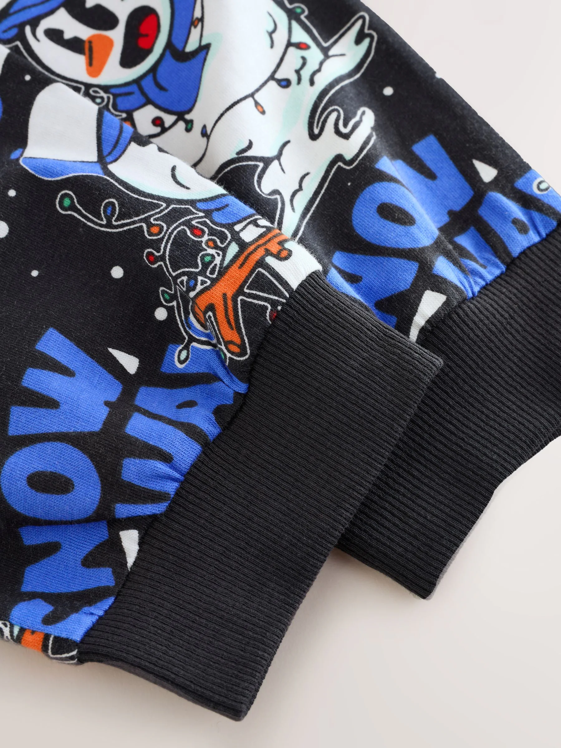 Blauw/zwarte sneeuwpop - Enkele kerstpyjama (5-16jr)
