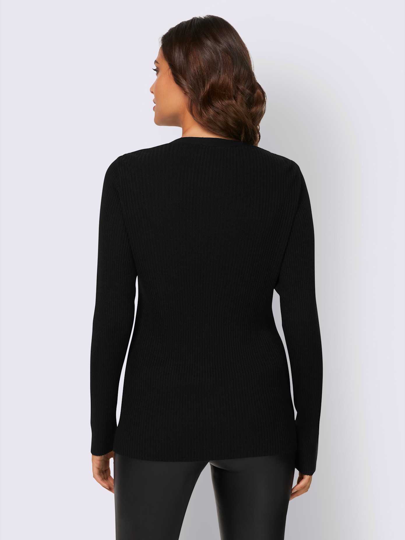 Veste en tricot découpes raffinées