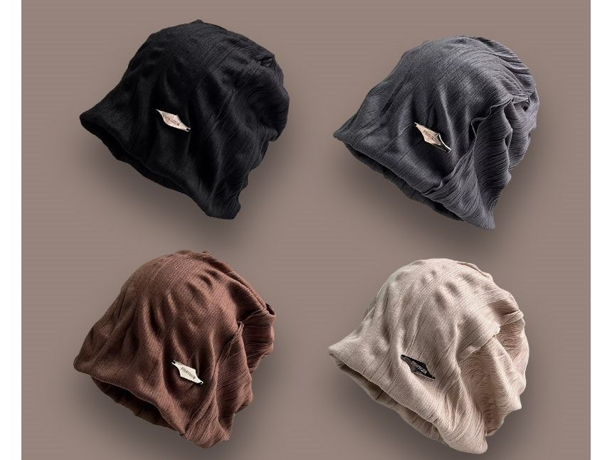 TAAK - Slouchy muts met appliqué
