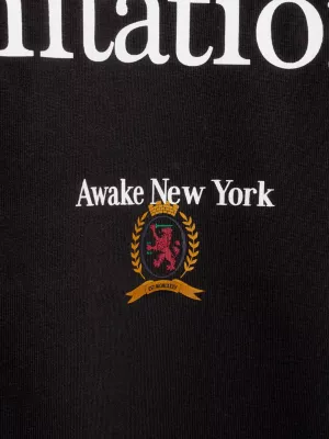 Camiseta Tommy x Awake NY com slogan nas costas