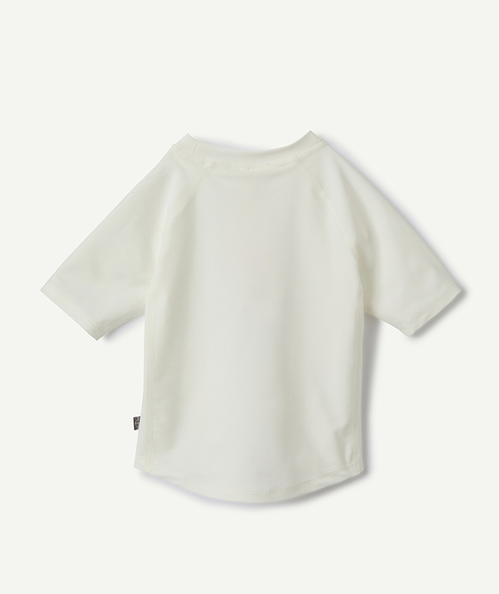 LASSIGT-SHIRT MANCHES COURTES BÉBÉ FILLE ANTI-UV ÉCRU AVEC MOTIF CHAMEAU