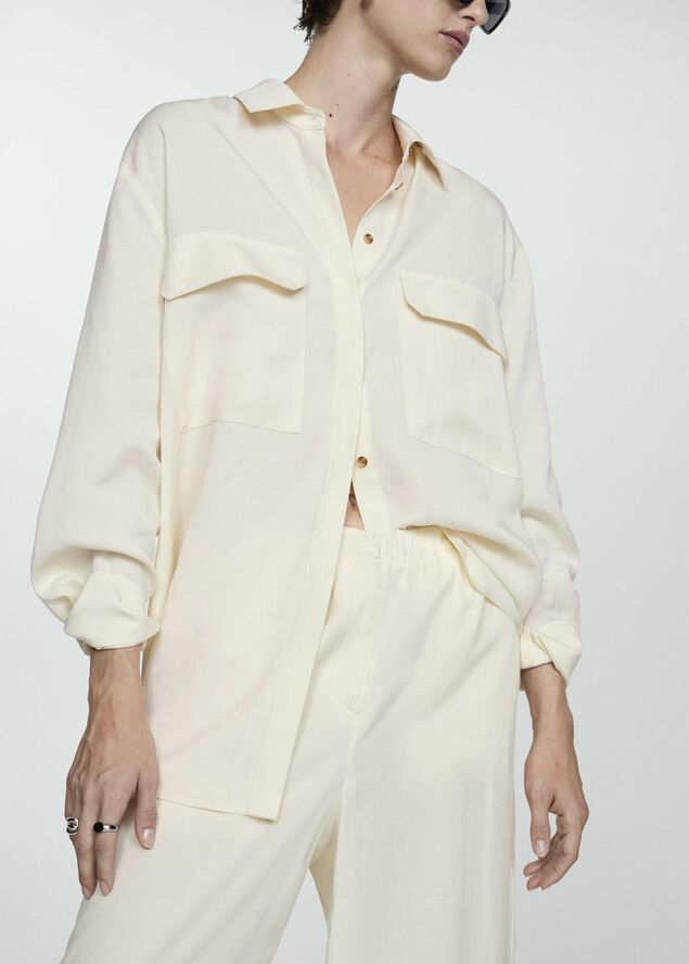 MANGO Wideleg lyocell trousers Light beige