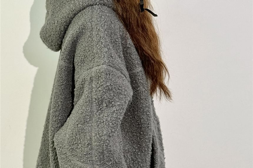 Trovelst - Geborduurde fleece oorklepmuts met paneel