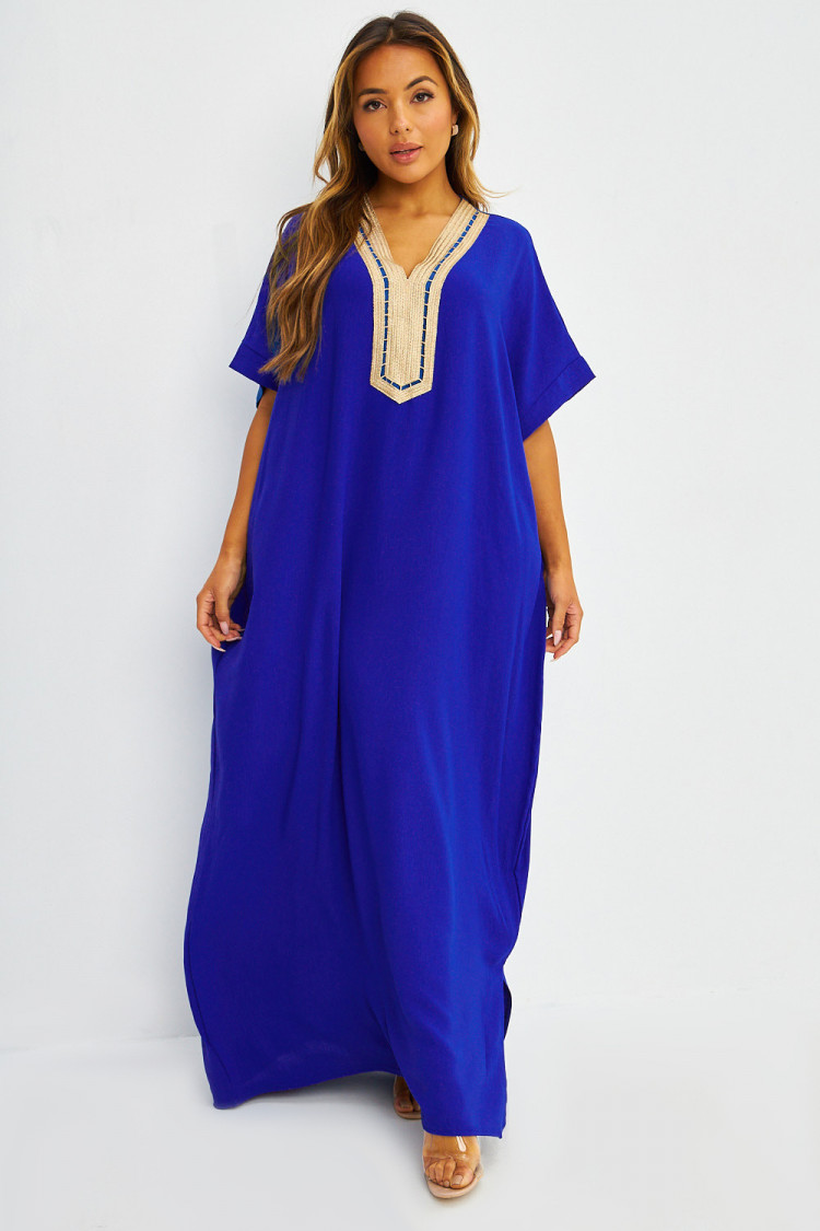 Abaya bleue à broderies dorées