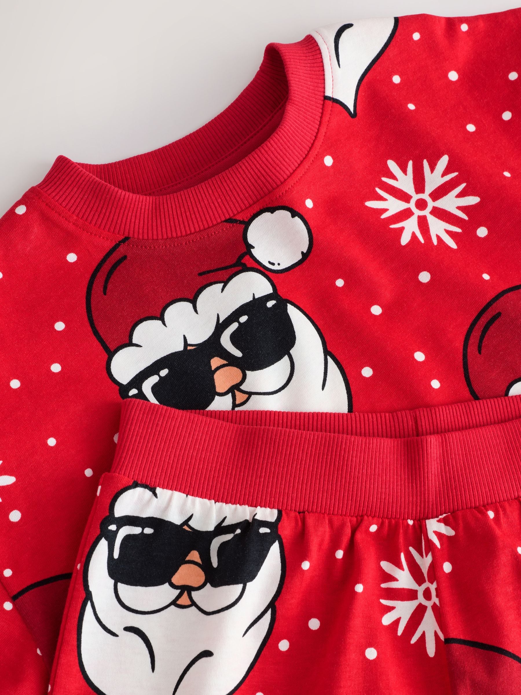 Rode kerstman - Kerstpyjama met enkele joggingbroek (3-16jr)