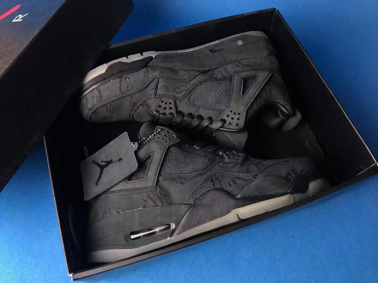 Jordan 4 Retro Kaws Black