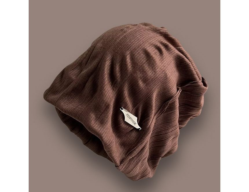 TAAK - Slouchy muts met appliqué