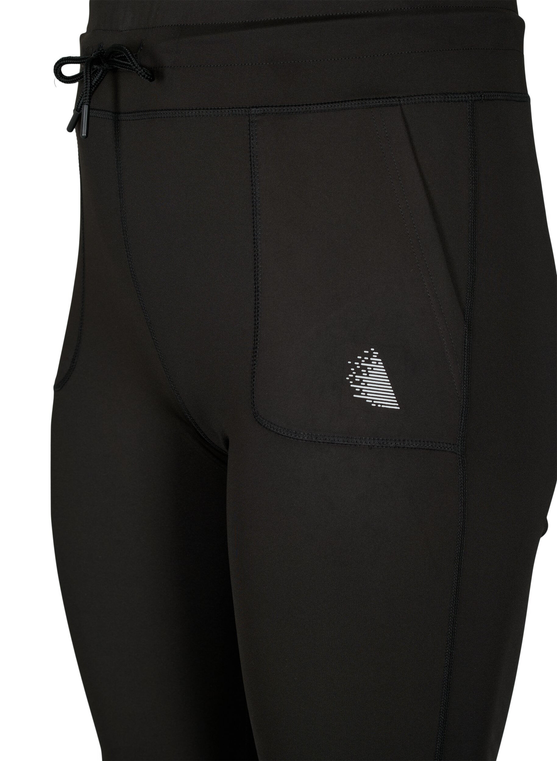 Tætsiddende træningsshorts med lommer