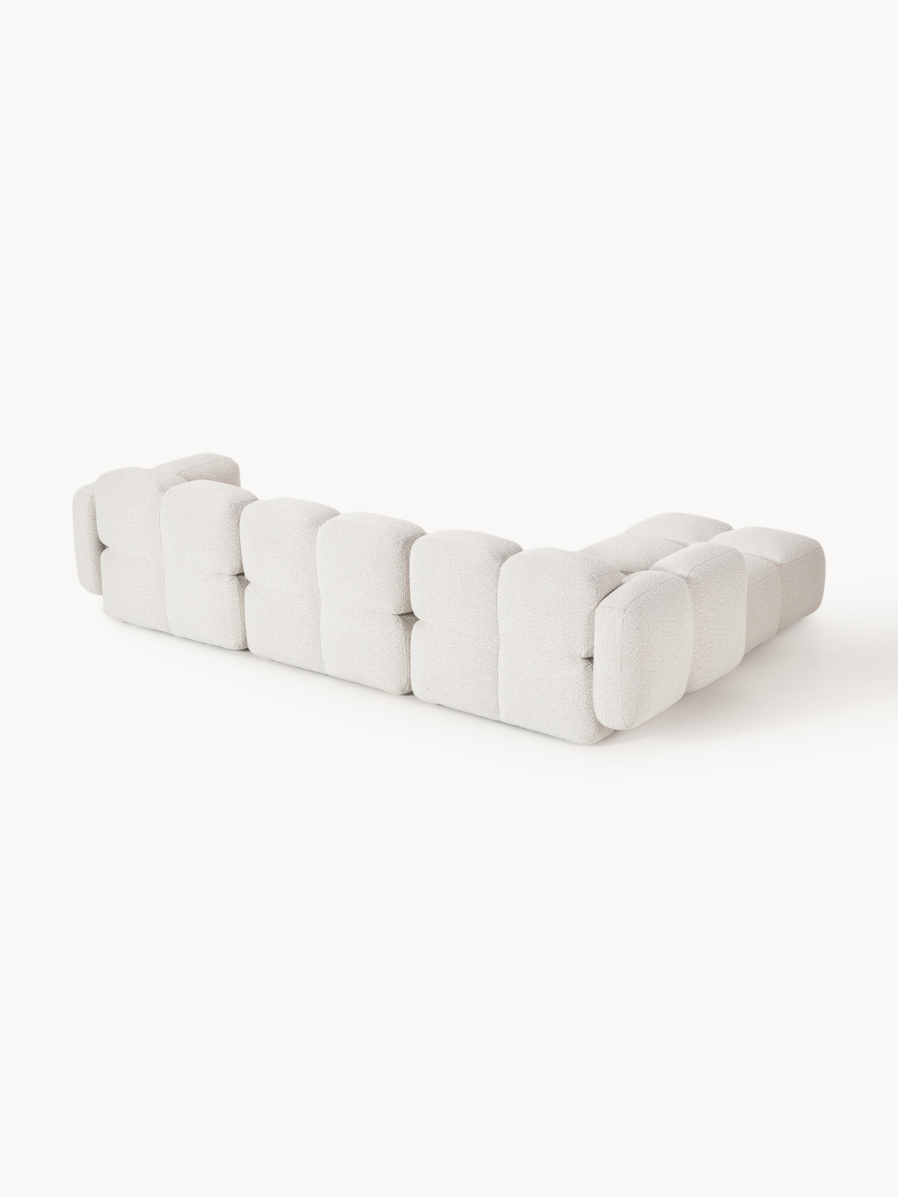 Modulaire bank Tayla (4-zits) van bouclé met poef (links/rechts)