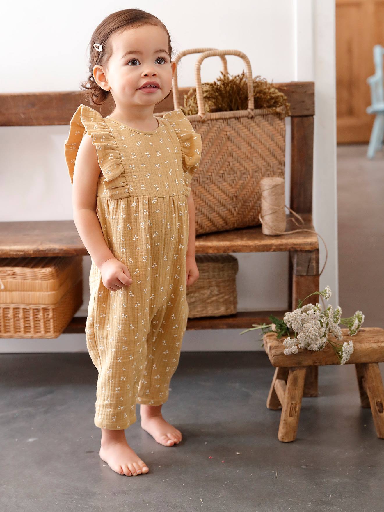 Macacão de bebê em chiffon de algodão amarelo claro