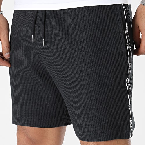 Short Jogging A Bandes Reebok Identity Vector Tape HS9441 Noir