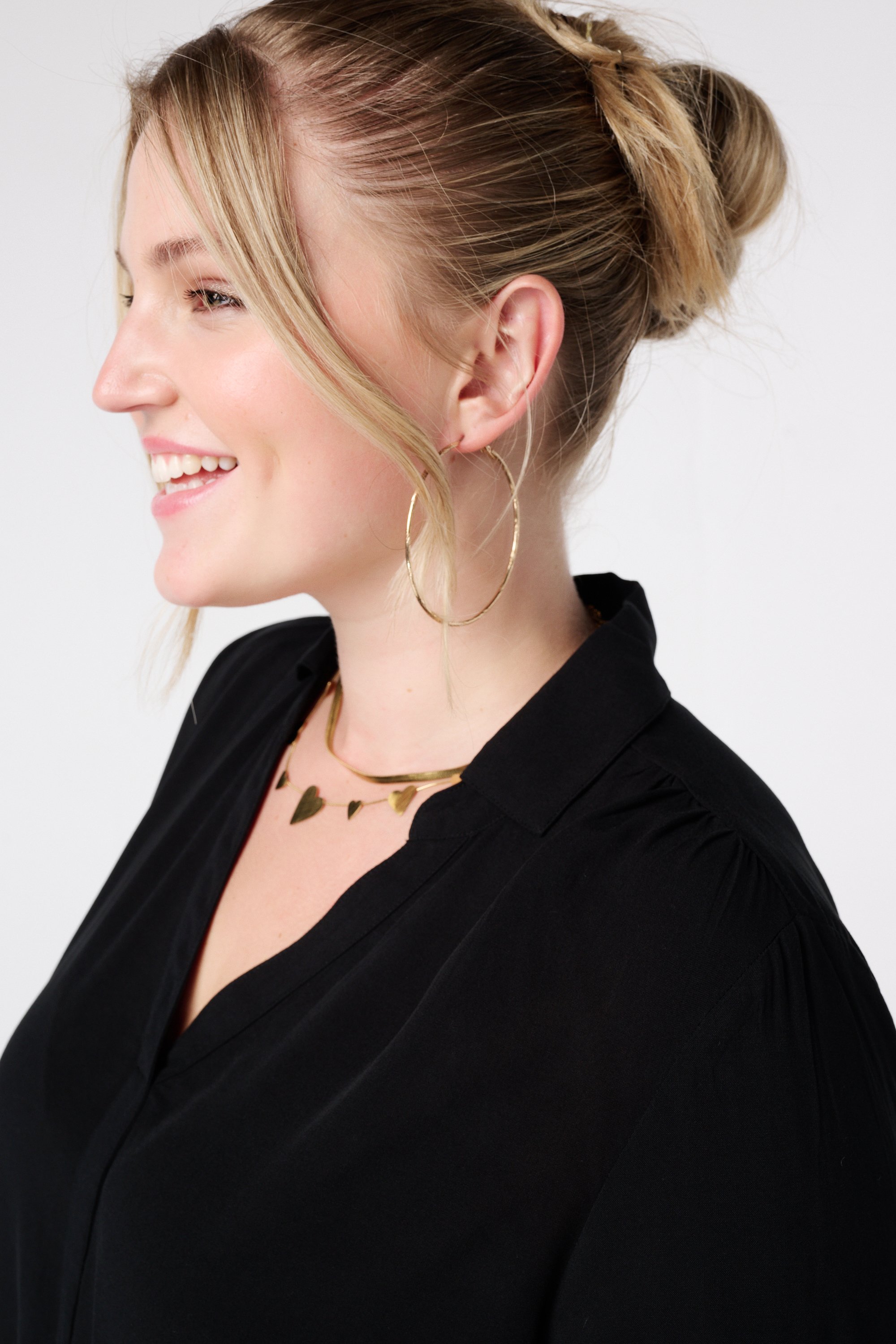 Ruimvallende blouse met v-hals Zwart