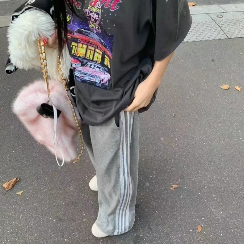 Rosesand - Hoge taille gestreepte kanten fluwelen joggingbroek met wijde pijpen en losse pasvorm