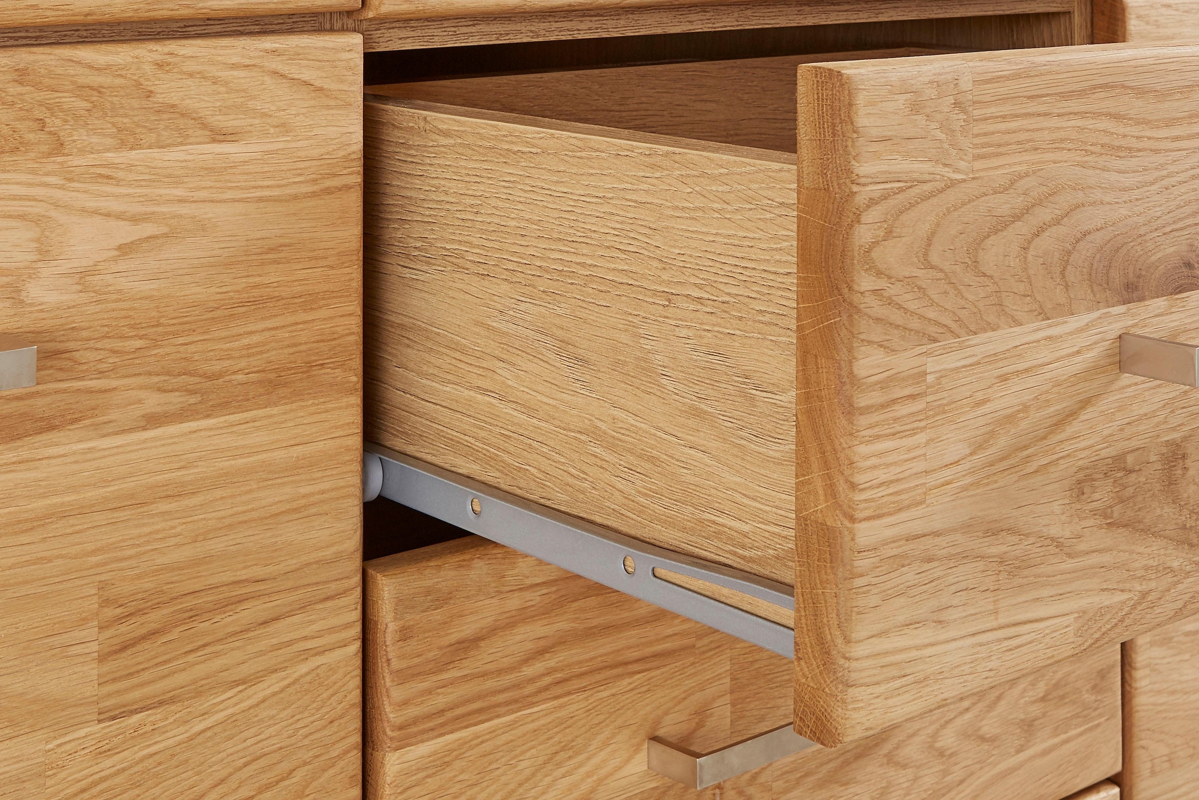Home affaire Highboard »Ribe,125cm breit,115cm hoch, Fronten Massivholz,5Türen,3 Schubladen« Holz massiv, Holzwerkstoff, Metall Griffe,10Fächer, Böden versetzbar