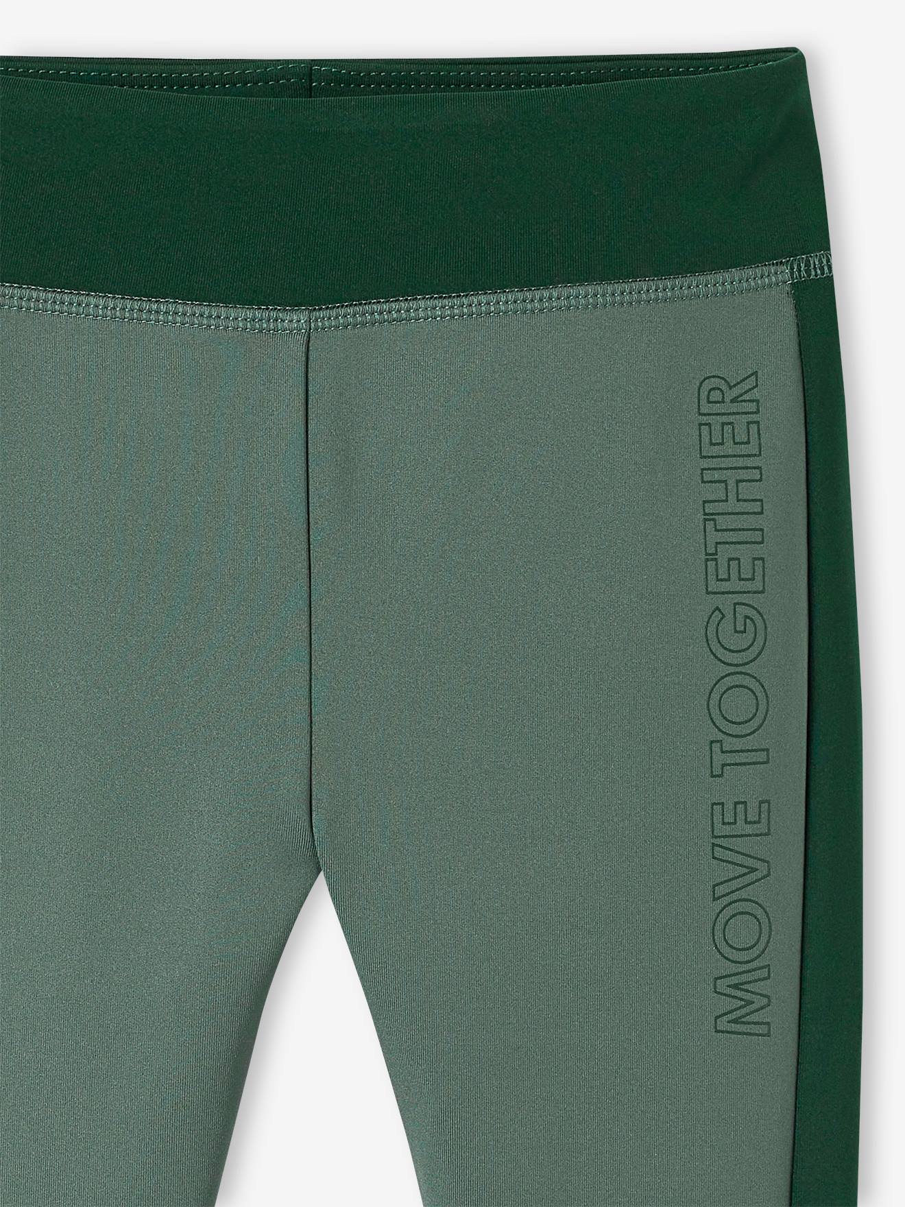 Leggings esportivas lisas rosa claro para meninas com listras laterais.