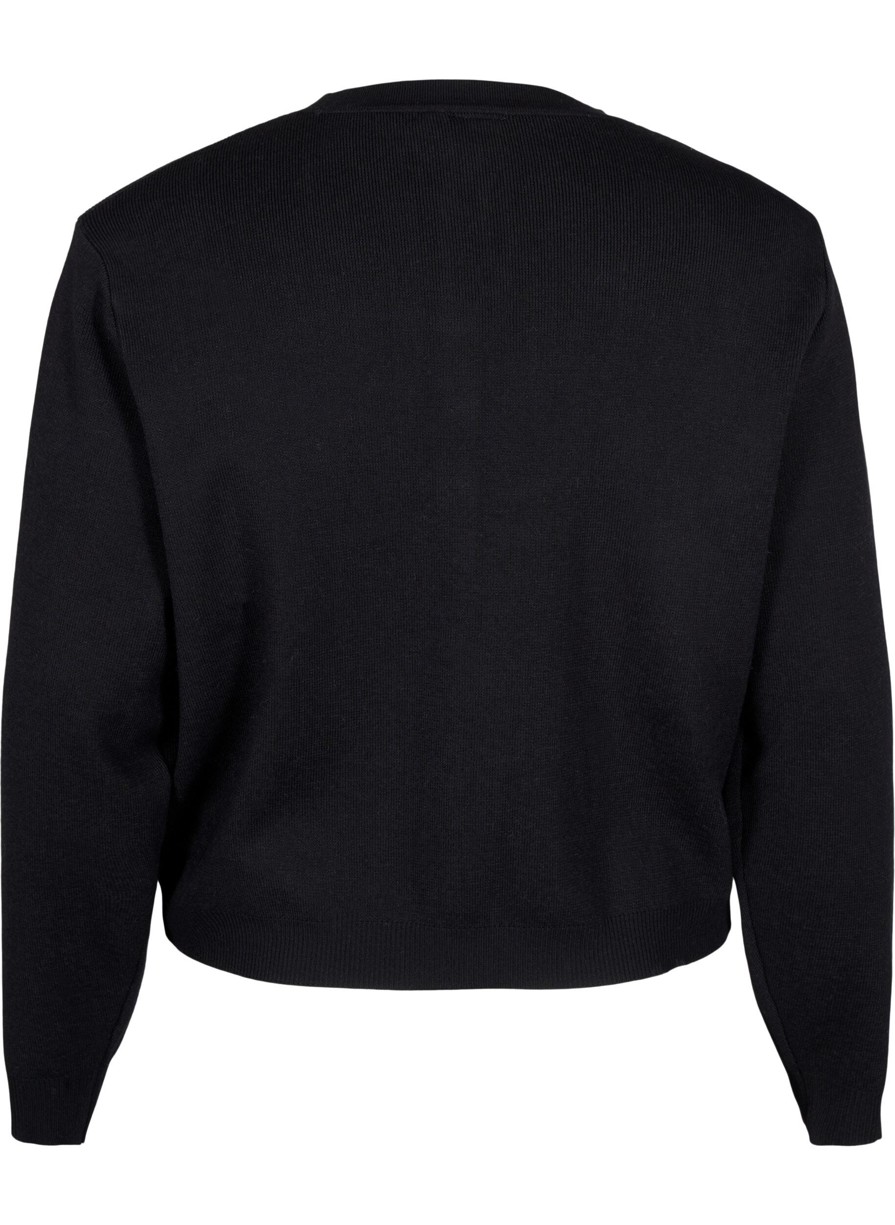 Strikcardigan med dekorative knapper